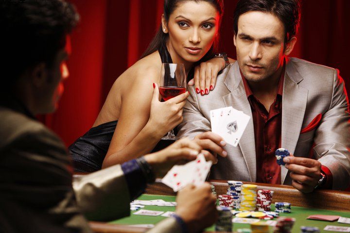 gerai live casino studio with MotoGP standings displayed on secondary screen